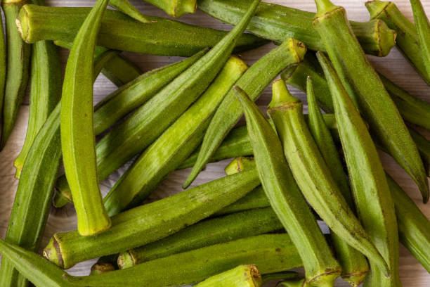 istock Top view of the okra vegetable (also called as ladies finger). 1298489273