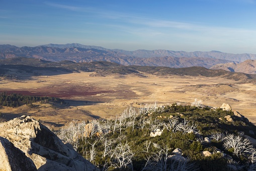 Rancho Cuyamaca State Park Landscape with Aerial View of Prairie Plains and Distant Mountain Range of Anza Borrego Desert on Horizon from Stonewall Peak in California, USA