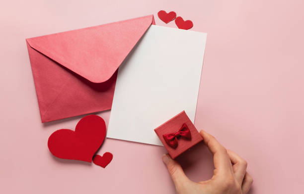 istock Valentine's Day gift. Ring, proposal of marriage, flat lay 1298499457
