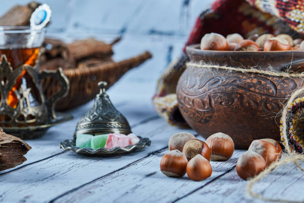 Date fruits (medjool) on a silver traditional plate for traditional sweet and feast festival (called bayram in Turkish). This feast festival coming after Ramadan month and related with religion and also called Ramadan Feast.