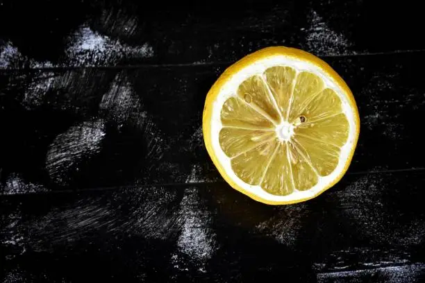 Lemon cutaway. Vitamin C./ Conceptual image of diet and detox