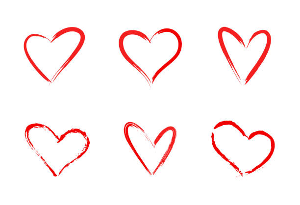 istock Red heart icon set in hand drawn style. Grunge heart shape isolated on white background. 1298517871