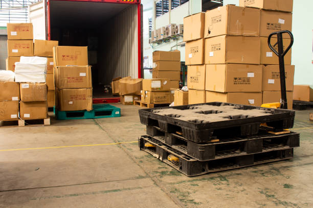 istock The cartons with loading out of container 1298522535