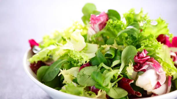 istock bowl of fresh lettuce leaf 1298522702