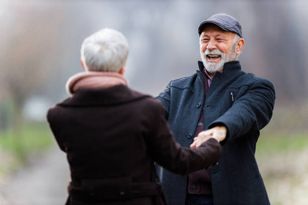 istock Cheerful senior couple having fun in winter day. 1298522719