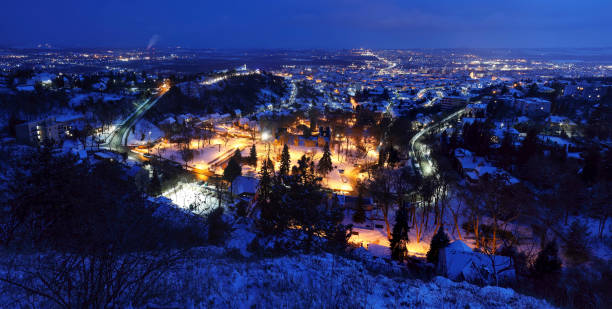 Pecs city at night from above in blue hour
