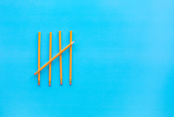 istock Yellow pencil on blue background.For business idea 1298535689