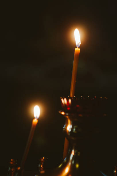 istock Burning candles in the dark 1298540685