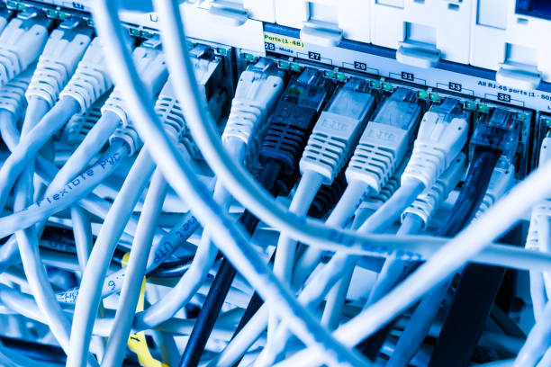 istock close-up of ethernet cables and switch 1298540858