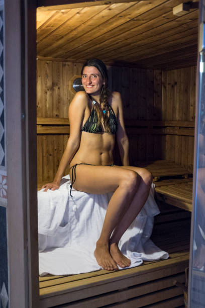 istock young woman in a sauna 1298542419