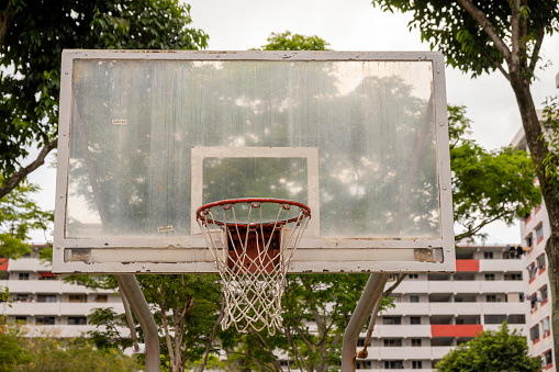 Dirty and Weathered basketball hoop on the street, Front View. Stock Photo.