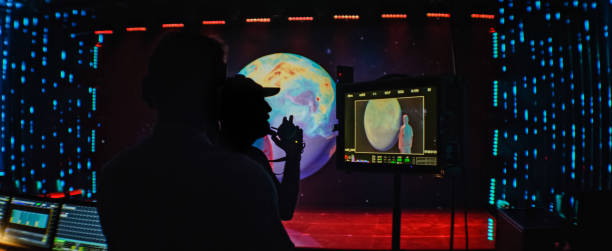 istock Movie set in silhouettes. Large screen with projection in background 1298550002