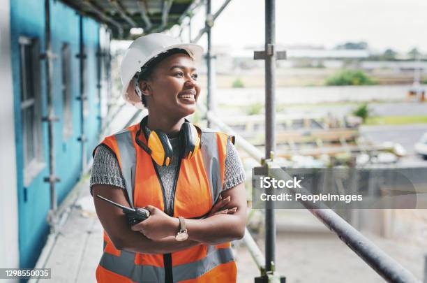 Putting In The Dedication To Build Her Dreams Stock Photo - Download Image Now - Occupation, Construction Industry, Construction Site