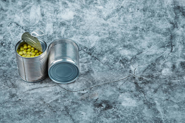 istock Marinated green pea beans in metallic cans 1298550119