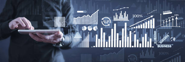 istock Businessman with a growth graphs. Business. Development. Success 1298553016