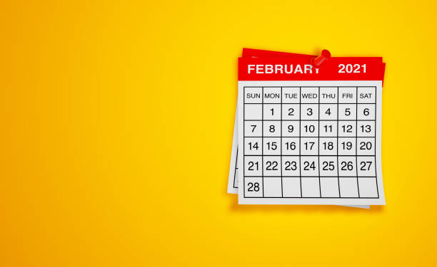istock February 2021 calendar on yellow background 1298554768
