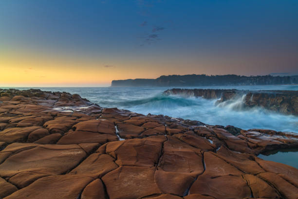 istock Early Morning Seascape from Rock Platform 1298556614