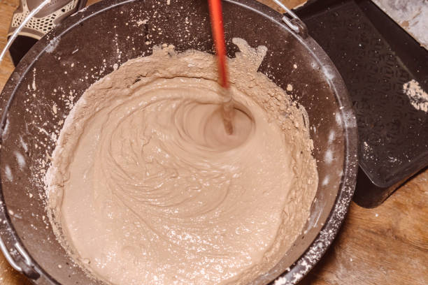 istock preparing a mortar plaster stirring mix water consistency emulsion finishing 1298556650