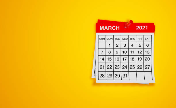 istock March 2021 calendar on yellow background 1298557252
