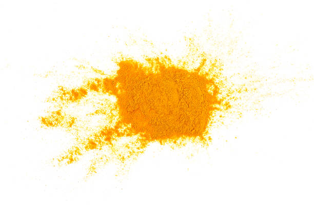 istock Turmeric powder pile isolated on a white background, top view. Curcuma powder. 1298557522