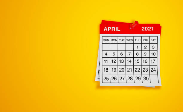 istock April 2021 calendar on yellow background 1298558427