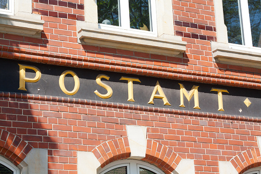 Capital letters POSTAMT of former post office in Bad Lippspringe