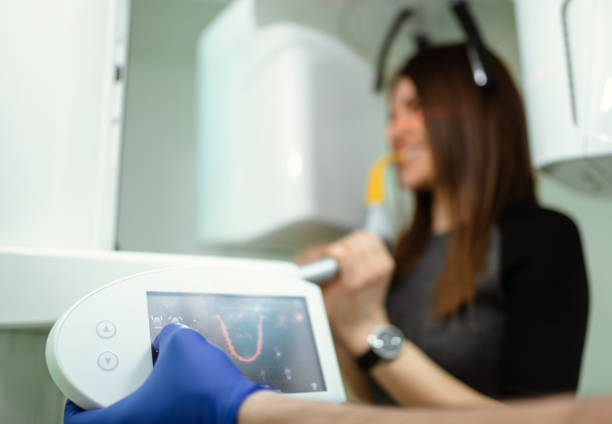 istock Young woman having dental scan 1298563660