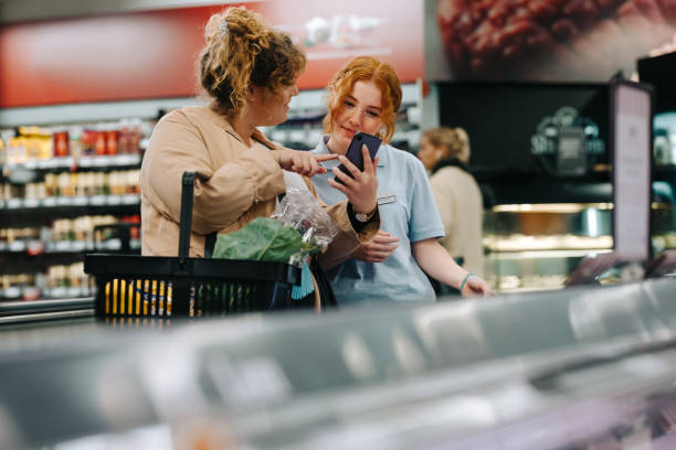 7,700+ Grocery Helping Customer Stock Photos, Pictures & Royalty-Free