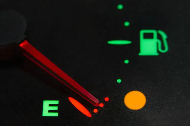 Photo of fuel level indicator in reserve, without fuel. Fuel empty.