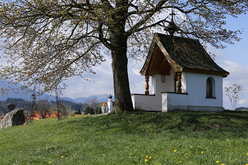 Chapel on hill and meadows over Brumov town in Moravia