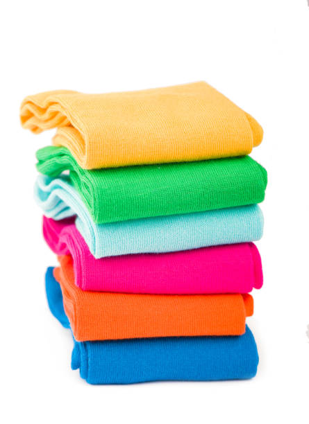 istock Pile of colorful socks on white background 1298572245