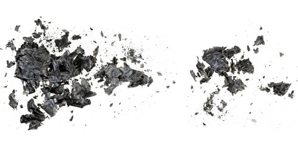 istock Burned and charred paper isolated on a white background, top view. 1298576195