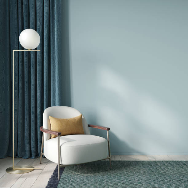 interior in blue with a stylish soft chair and a modern golden floor lamp - showcase interior inside of domestic room indoors imagens e fotografias de stock