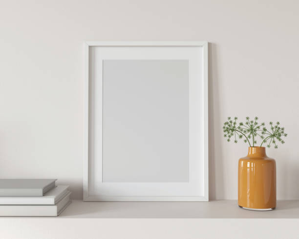 istock Interior Frame Mockup with a glass vase and books 1298576296