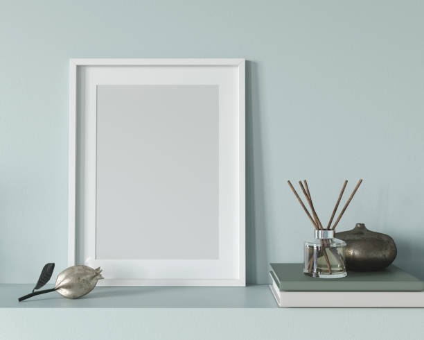istock Interior Frame Mockup with a glass and metal decors and books 1298576322