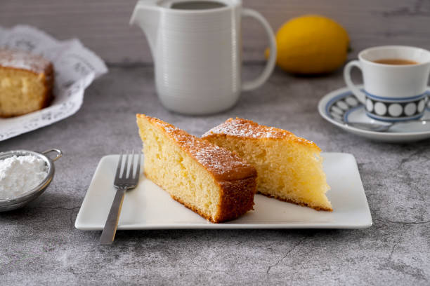 istock Lemon pound cake on rustic wooden background with lemon 1298576532