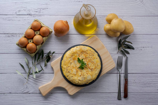 istock Traditional spanish omelette on wooden table 1298576629