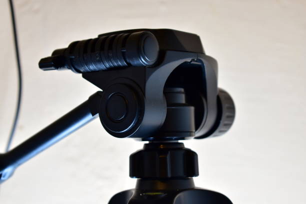 istock fragment of a camera tripod in contrasting light 1298579008