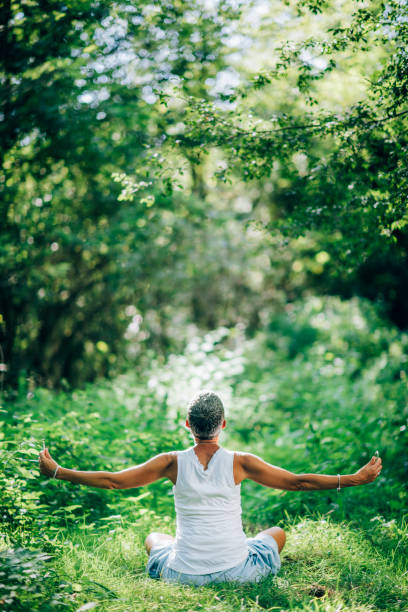 istock Practicing Mindfulness for Gratitude and Fulfilment, Feeling Connected with Nature 1298581506