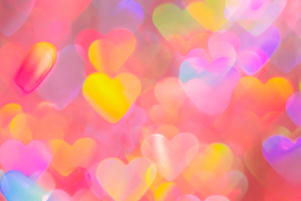 istock blurred heart shaped holographic bokeh lights background 1298587716