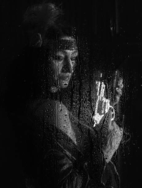 istock woman with a revolver in her hands 1298588088