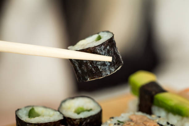 istock Fresh sushi selection on wooden board 1298588720