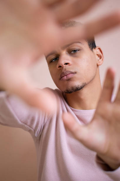istock Young African American man showing hands 1298589045
