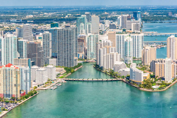 Miami Skyline Aerial The skyline of the beautiful city of Miami, Florida shot from an altitude of about 1000 feet over the Biscayne Bay Miami's Real Estate stock pictures, royalty-free photos & images