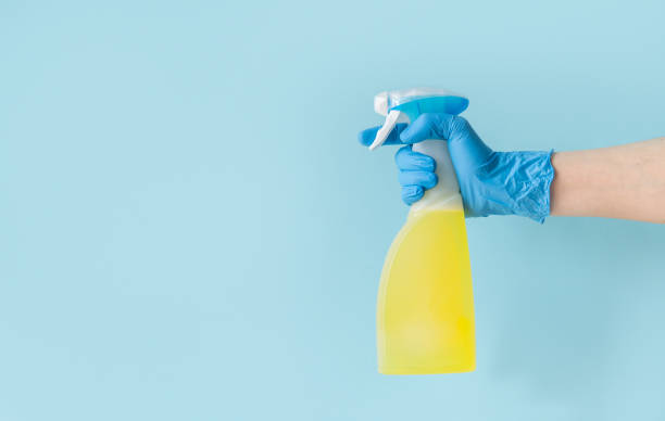 istock Coronavirus concept - hand holding sanitizer 1298595582