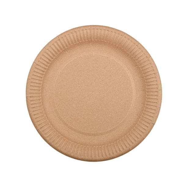 istock Disposable brown paper plate isolated on white 1298602759