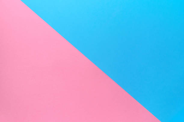 istock Creative blank paper background with two tone color. Blue and pink pastel geometric background, copy space. Fashion texture, overlap, minimal concept. Flat lay, top view 1298605599