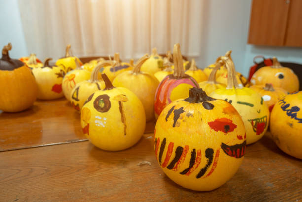 istock Painted Yellow Pumpkins for Halloween Holiday 1298605603
