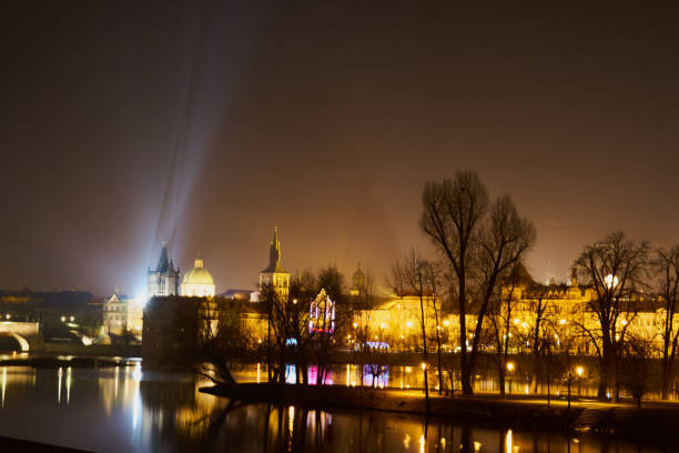 Prague, Czech Republic - January 1 2021: Night view of Charles Bridge and Old Town Tower in Prague