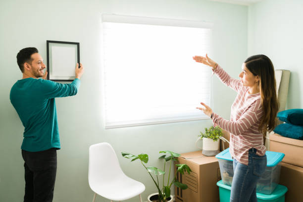 istock Boyfriend and girlfriend talking about home decoration 1298607504
